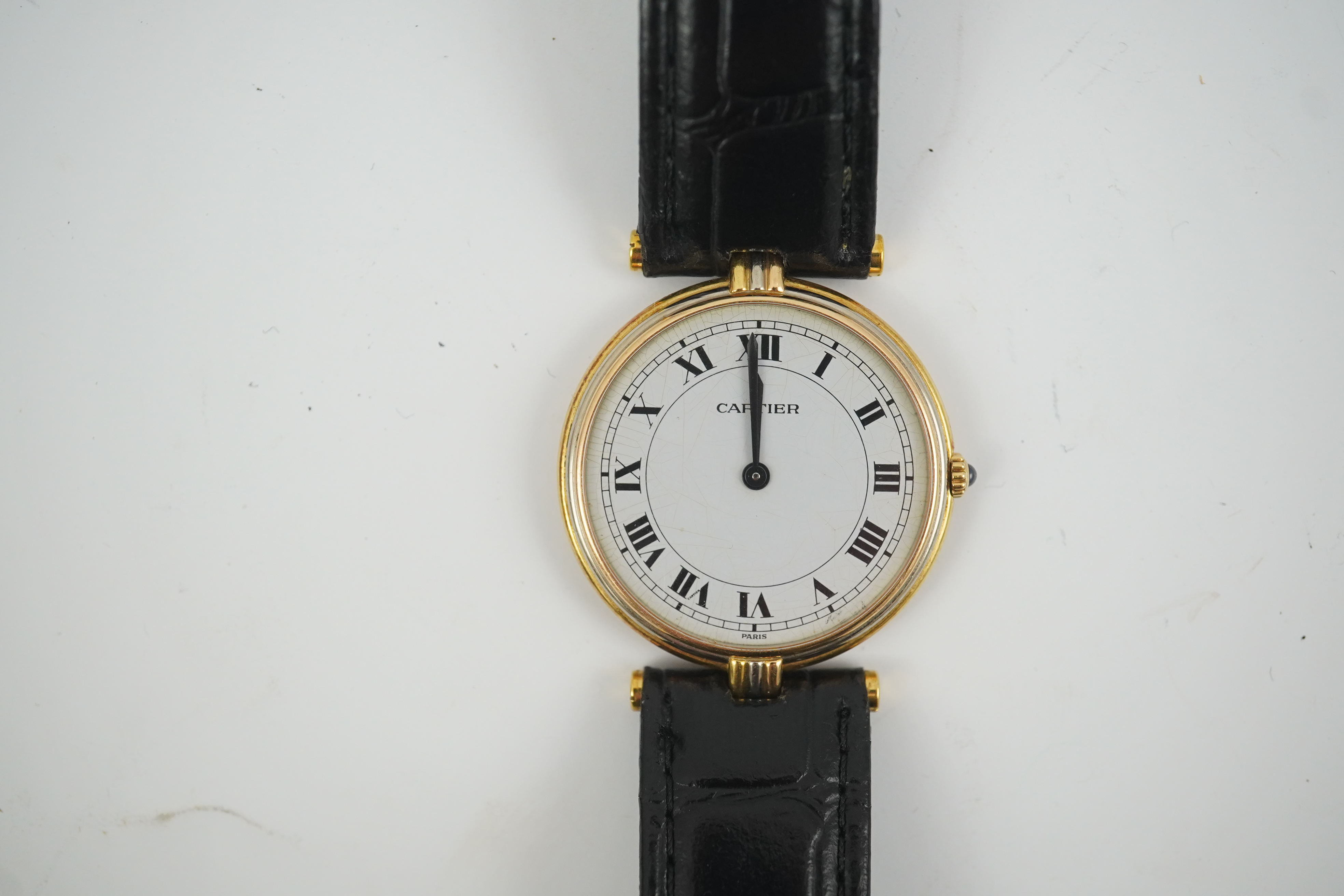 A modern 18ct gold Cartier Vendome quartz wrist watch, on an associated leather strap